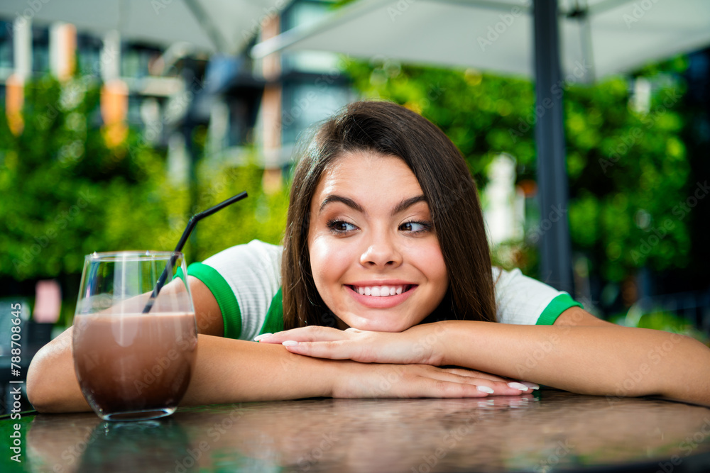 Poster photo of lovely shiny good mood girl sitting chair lying on table drinking refreshing cocktail sunny