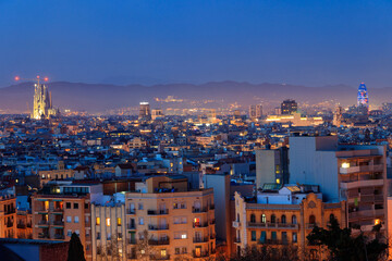 The skyline of Barcelona with the famous Sagrada Familia at night, Spain