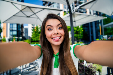 Photo of adorable cute girl dressed stylish clothes having fun good mood streaming broadcasting...