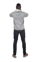 back view of a man covering her face with her hand on white background - 788736836