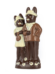 Family pair of handmade chocolate rabbits in love on a white background