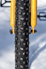 snowflakes on bicycle off-road rubber tread