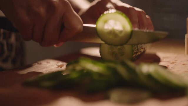 Eating strawberries, washing and preparing vegetables in the kitchen