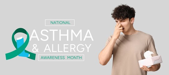 Young man with runny nose on grey background. Banner for National Asthma and Allergy Awareness Month - obrazy, fototapety, plakaty