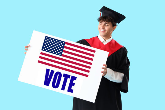 Male graduate student with blank poster on blue background