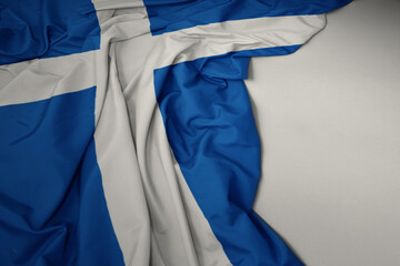 waving national flag of scotland on a gray background.