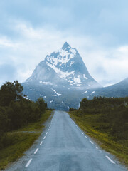 Empty road to mountains landscape in Norway scandinavian nature beautiful travel destination moody scenery - 788767279