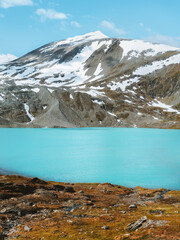 Lake Rottenvikvatnet and mountains in Norway landscape turquoise glacier water travel Lyngen Alps beautiful destinations scandinavian northern nature scenery summer season scenic view - 788767873