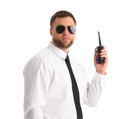Male police officer with radio transmitter on white background