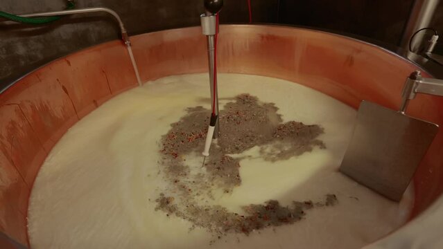 Traditional cheese making with copper vat and hand techniques