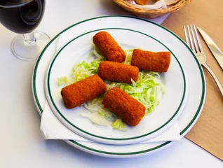 Badkamer foto achterwand Spanish flamenquines, breaded pork loin rolled with serrano ham, typical of Andalusia © JackF