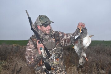 Hunter with duck 
