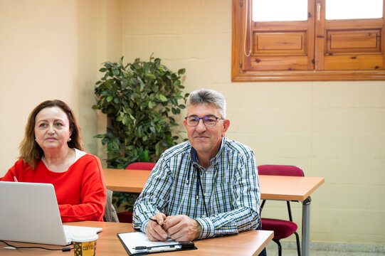 Lifelong learning concept with senior adults in classroom