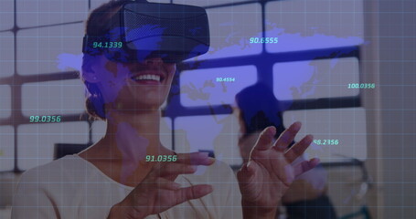 Caucasian woman wearing VR headset, interacting with virtual data