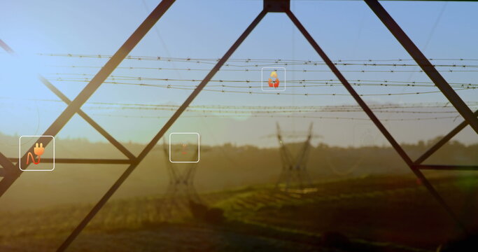 Digital interfaces float in front of farm landscape at sunrise