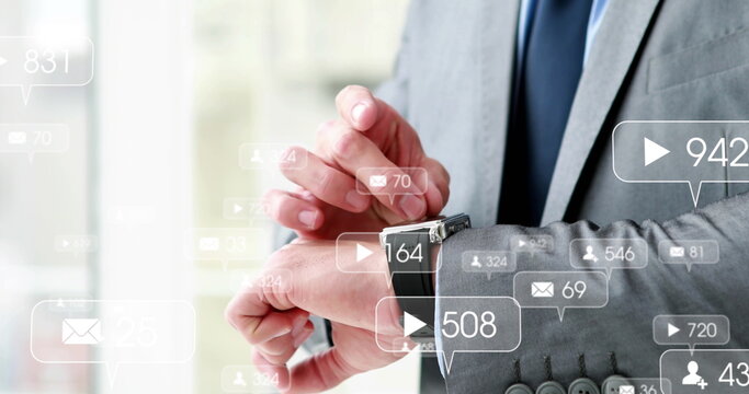 Caucasian male influencer checking smartwatch, icons floating around - Powered by Adobe