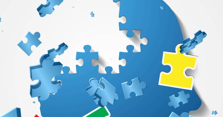 Blue and yellow puzzle pieces are floating against white background