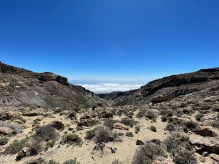 Fototapeta premium Vast desert valley with Tenerife and cloudy sky