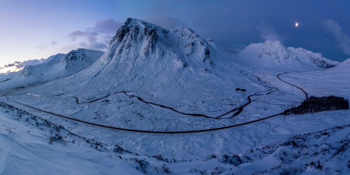 Sunrise over snow-covered Glencoe in Winter