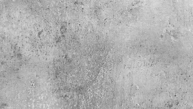 Zoom-in footage of an old seamless gray concrete surface. concrete surface background
