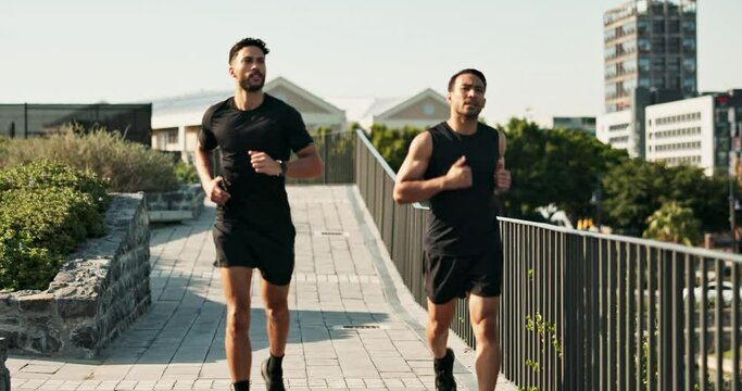 Outdoor, men and friends running, watch and check for time, jogging and exercise with fitness. City, athlete and runner with energy for workout, training and wellness for healthcare of male person