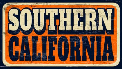 Aged and worn Southern California sign on wood