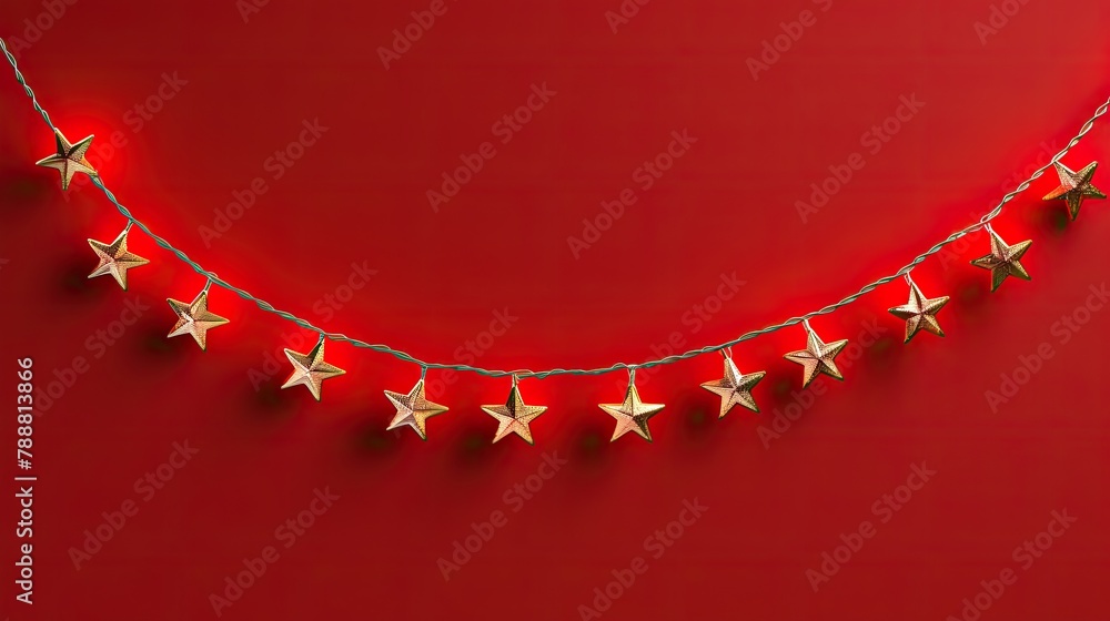 Poster this is a photograph of a string of lights with star-shaped bulbs. the lights are on and glowing aga
