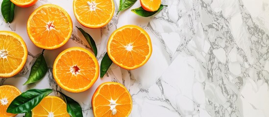 Food preparation with oranges in cooking and baking on a white marble background. Overhead view...