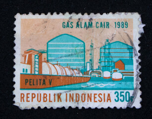Vintage philatelic stamp with gas factory illustration
