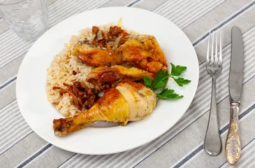 Foto op Plexiglas Appetizing pieces of fried chicken with rice on platter © JackF