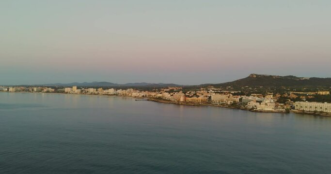 drone aerial from the city of calla millor at Mallorca at sunrise