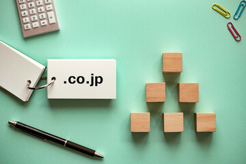There is word card with the word .co.jp. It is as an eye-catching image.
