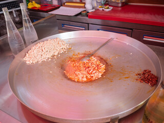 wide round cooking pan for turkish wrap in the restaurant of istanbul
