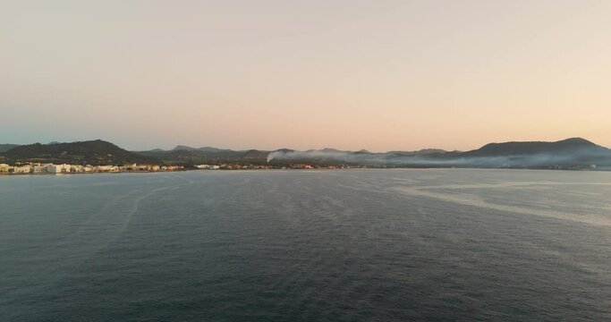 drone aerial from the city of calla millor at Mallorca at sunrise