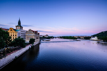 Fototapeta na wymiar Blue sky over the city of Prague waterfront