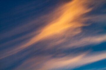 Yellow cloud in evening with blue sky background, abstract background 