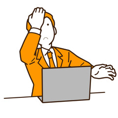 パソコンでトラブルを抱えるビジネスマン