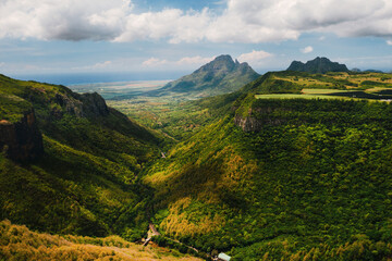 Mountain Landscape of the gorge on the island of Mauritius, Green mountains of the jungle of...