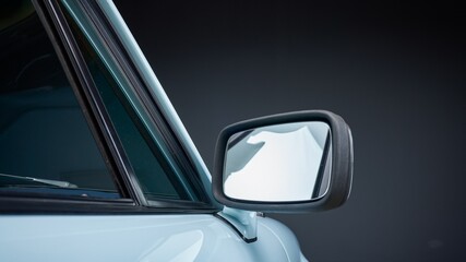 Passenger side mirror on a car - obrazy, fototapety, plakaty