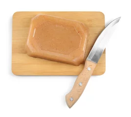 Fotobehang Delicious sweet quince paste and knife isolated on white, top view © New Africa