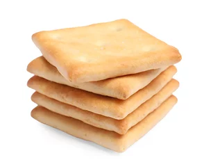 Fotobehang Tasty crispy square crackers isolated on white © New Africa
