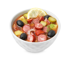 Meat solyanka soup with thin dry smoked sausages in bowl isolated on white