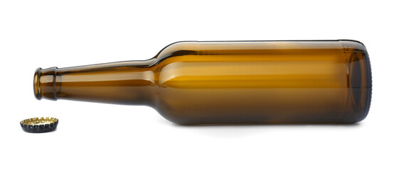 One empty brown beer bottle and cap isolated on white