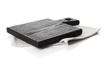 Schilderijen op glas Black wooden cutting board and napkin isolated on white © New Africa