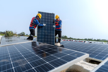 Photovoltaic engineers work on floating photovoltaics. workers Inspect and repair the solar panel equipment floating on water. Engineer working setup Floating solar panels Platform system on the lake.