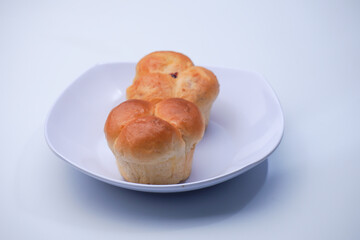 Market snack bread filled with jam on a white background