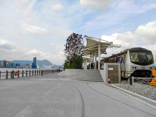Two retired East Rail Line Mid-Life Refurbishment train cars or "Fly Head" trains, at Wan Chai temporary promenade.