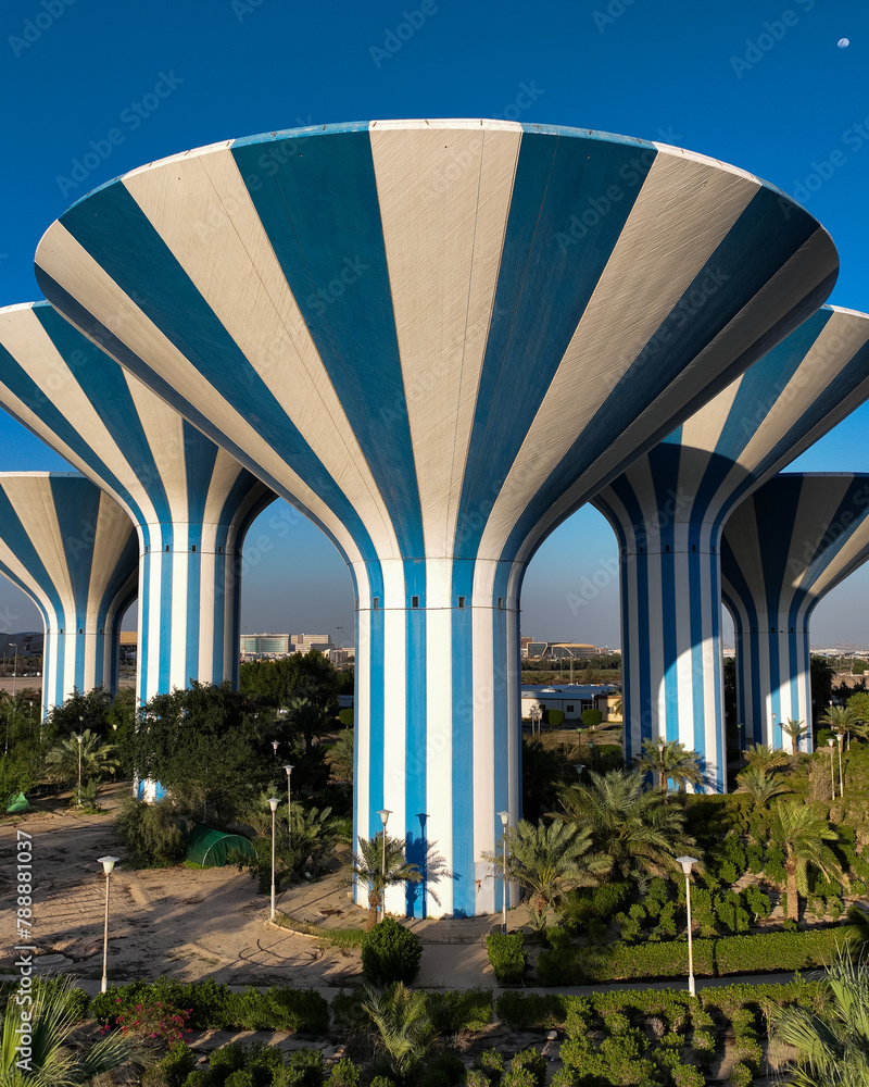 Wall mural close-up photography of white and blue water tank towers in the state of kuwait, the architectural e