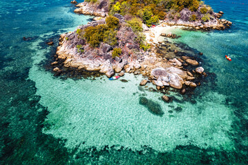 Aerial view of  island and clear water