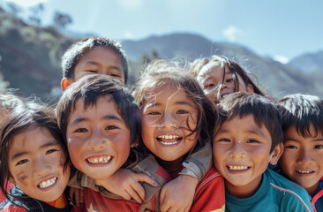 A group of multiethnic children smile and play together outdoors on a sunny day